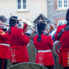 an army band play brass instruments