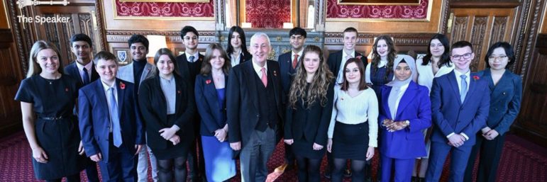 young people stood with Lindsay Hoyle, Speaker of the House of Commons