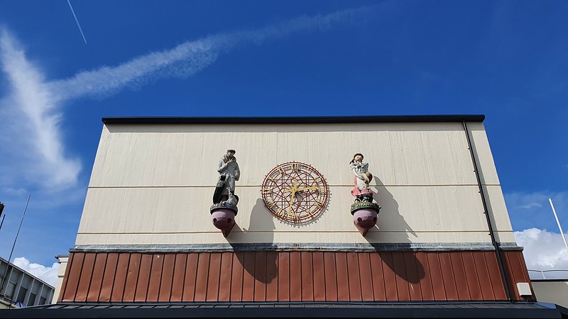 a clock on a theatre wall