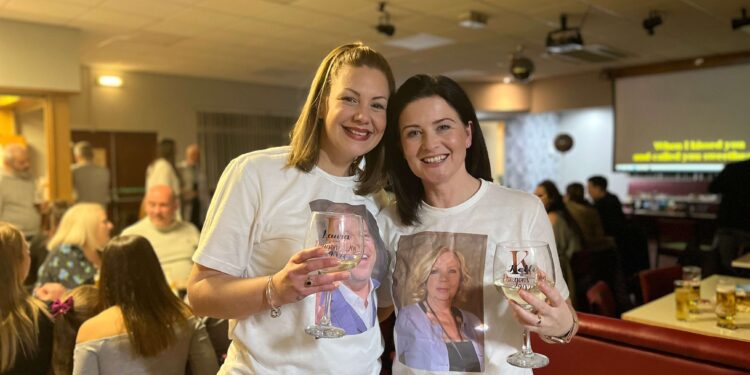 Kelli Aspland and Laura Waters wearing t-shirts of their dragon's den investors