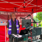 a radio DJ in a gazebo
