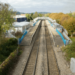 two tracks running through a train station