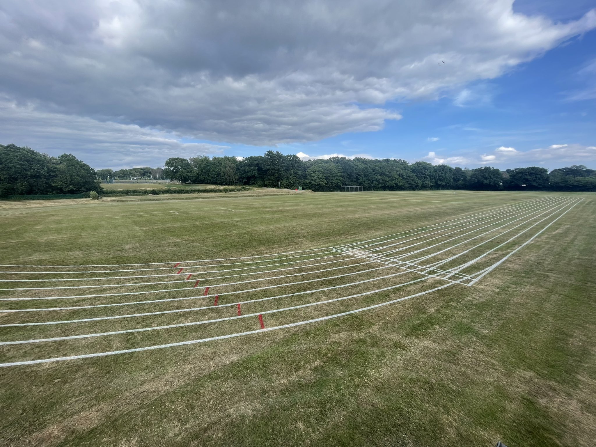 a sports pitch marked out with white lines for running