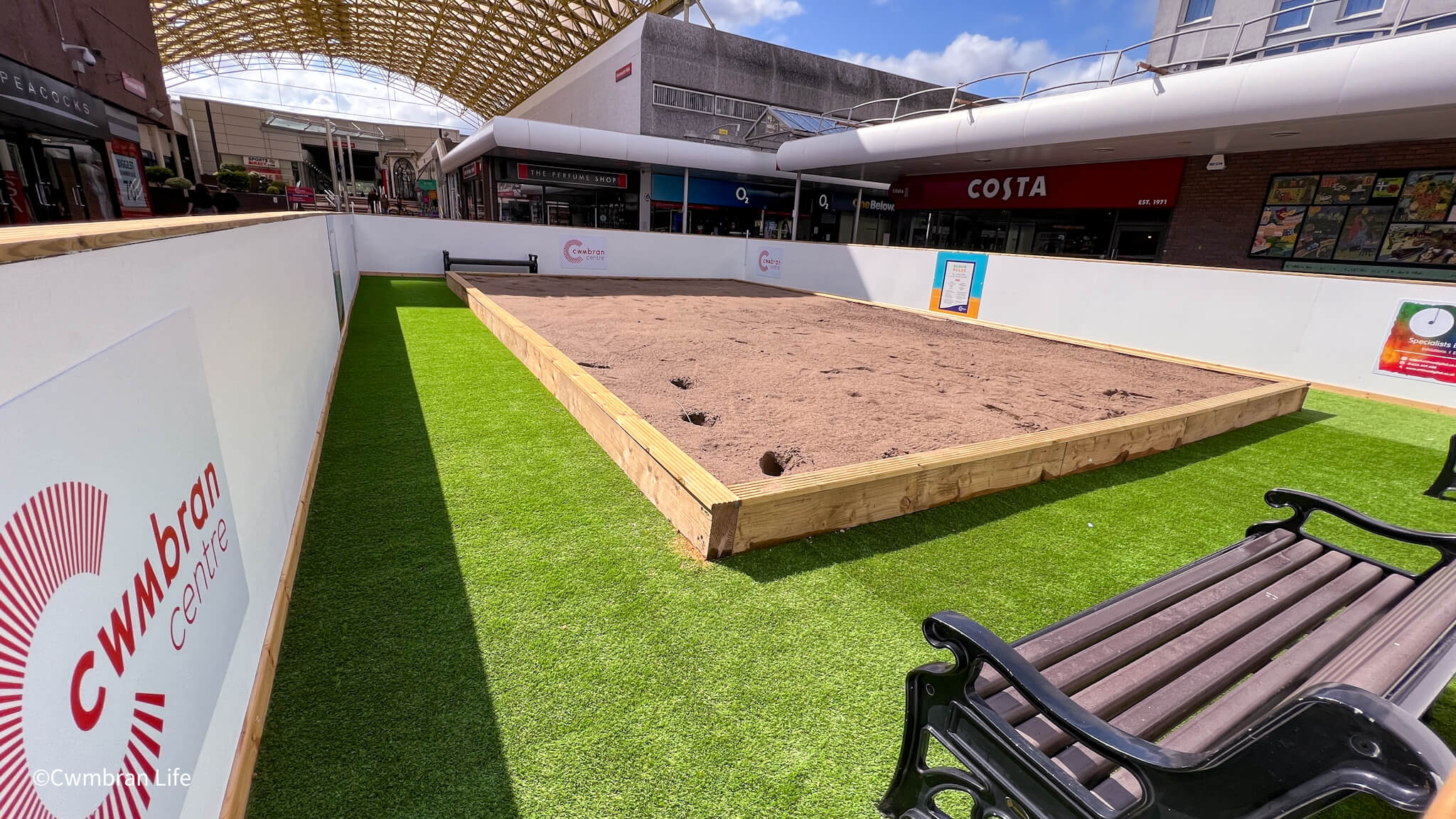 a sandy beach built in a town centre