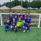 a football team smiling