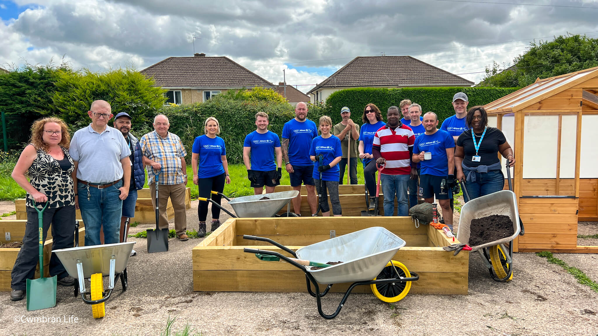 a group of people working on an allotment