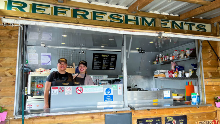 two women in a burger van