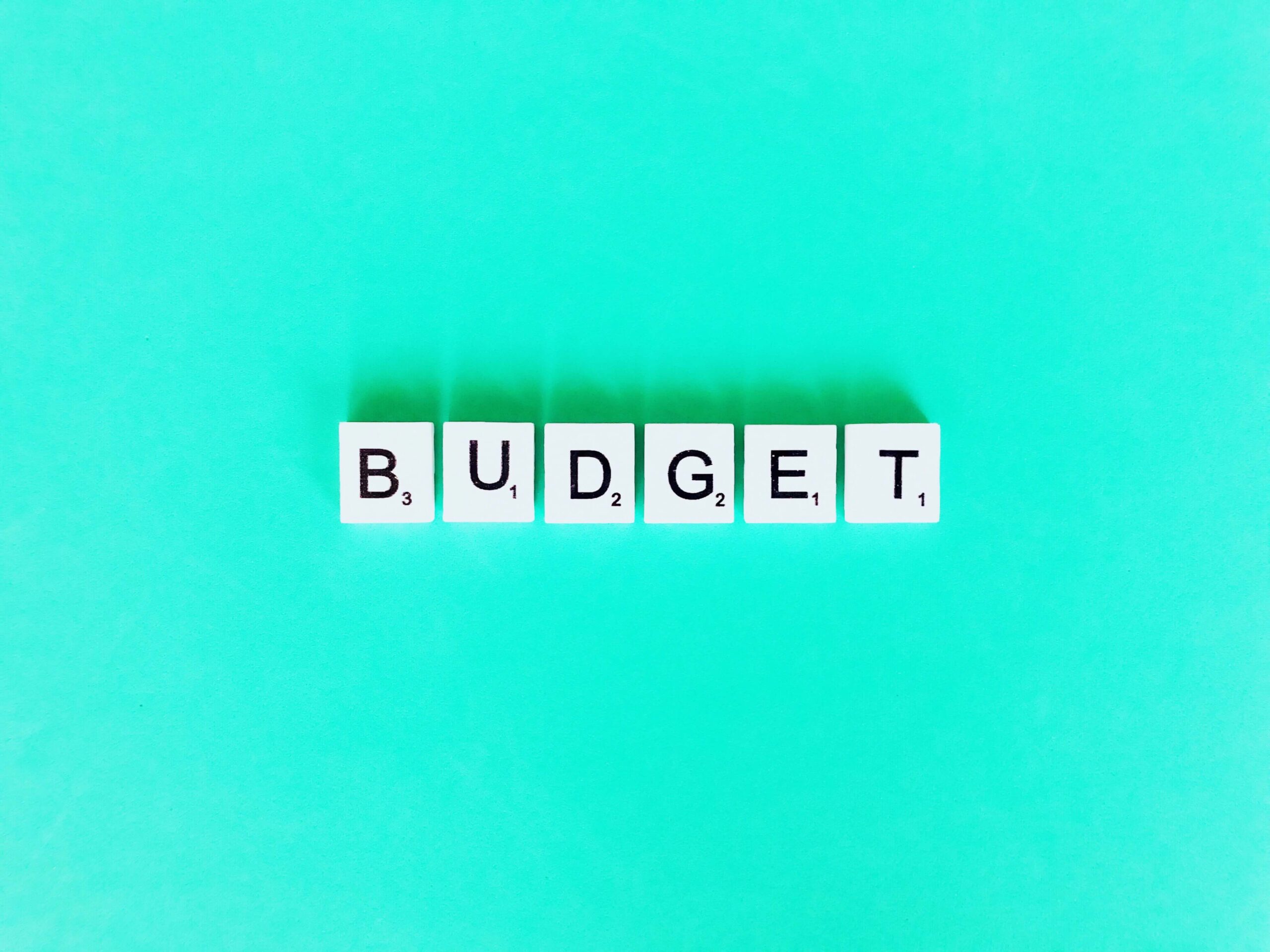 scrabble blocks saying the word budget