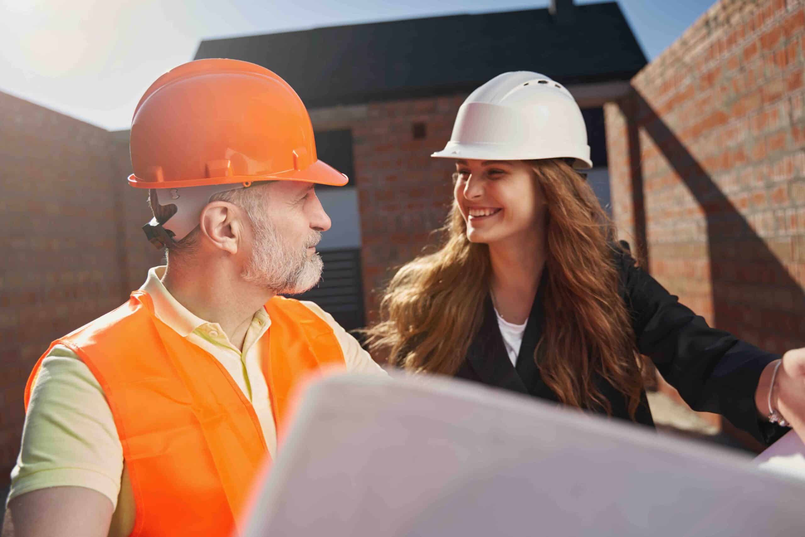 man and woman on building site