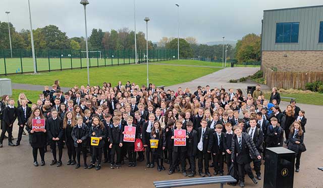 a large group of schoolchildren