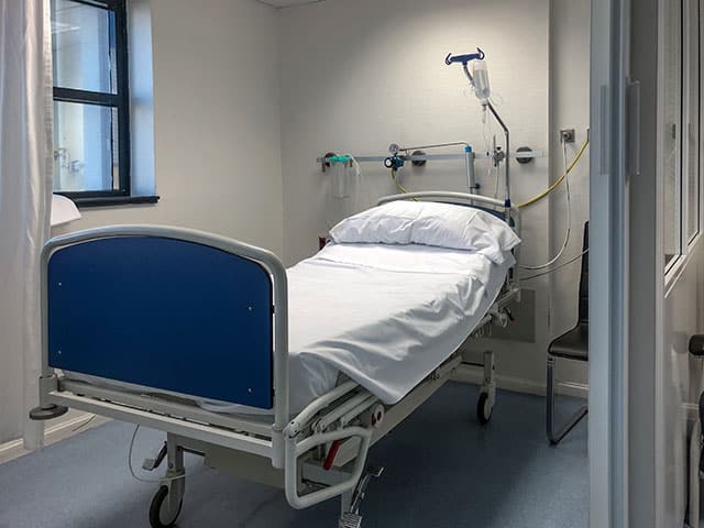 an empty hospital bed