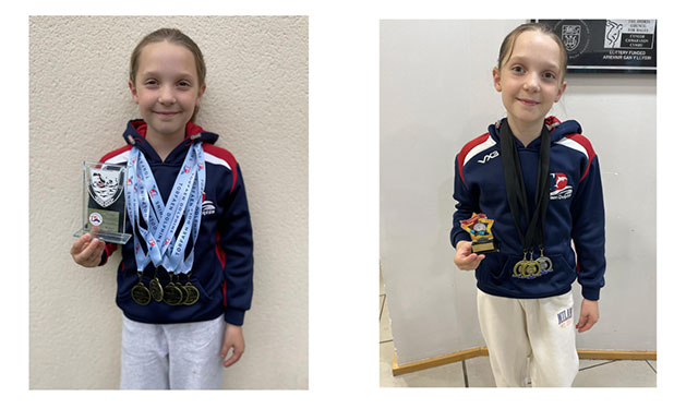 a young girl with several swimming medals