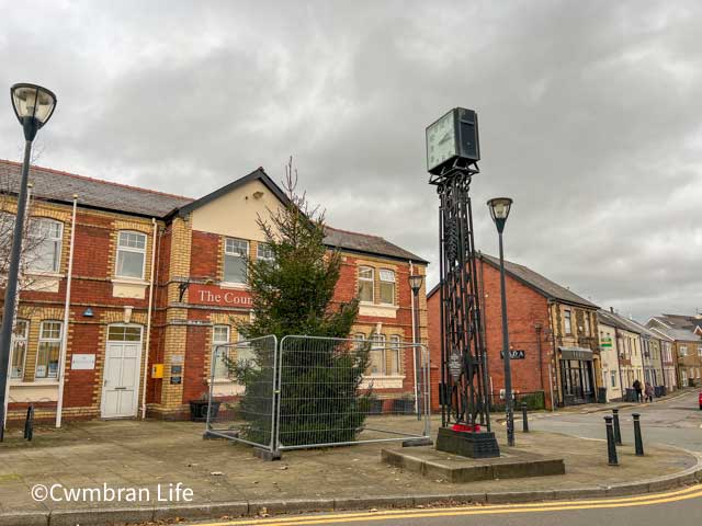 a christmas tree outside a council office