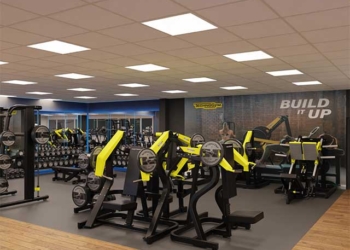 a weights room in a gym
