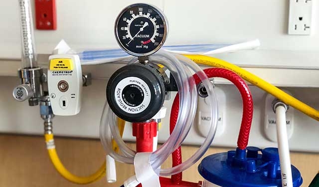 Hospital procedure equipment and it’s cords in a hospital room