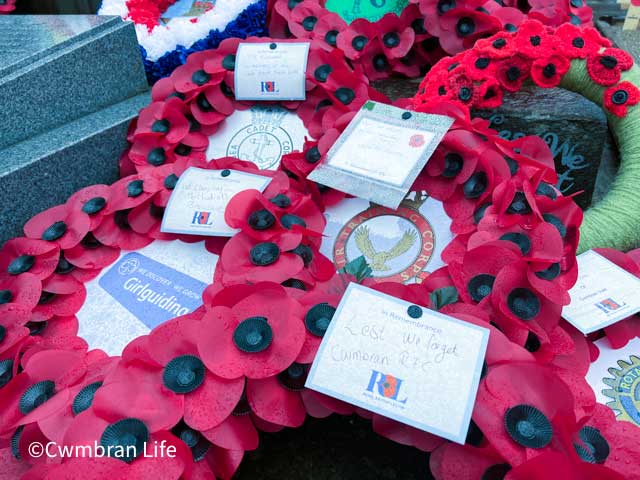 a number of poppy wreaths