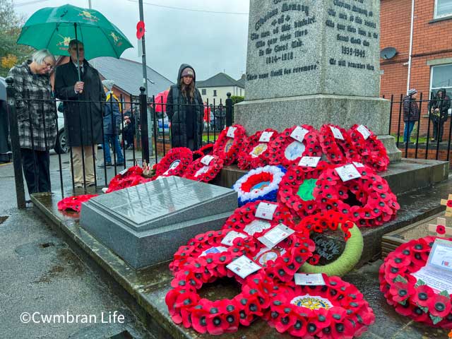 a cenotaph with poppy wreaths