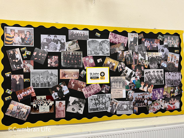 a wall display of photos