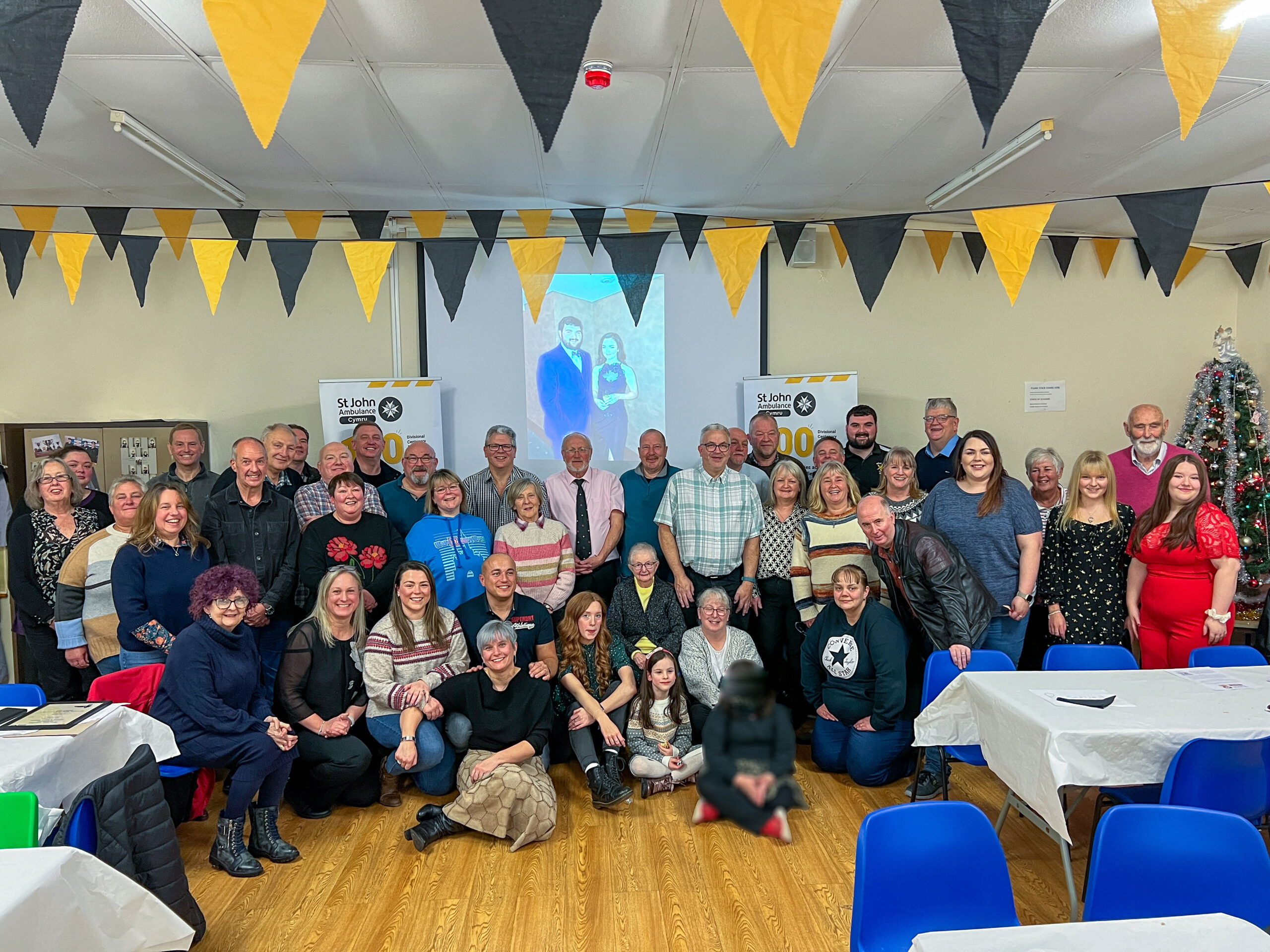 large group of people in a community hall