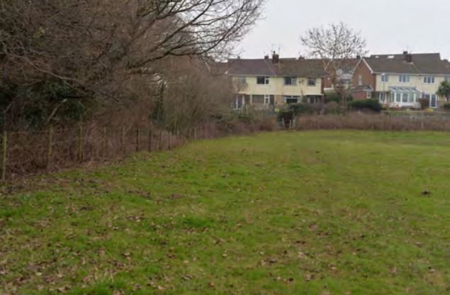 a field next to house