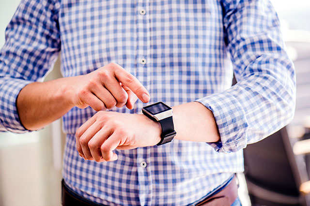 a man wearing a smart watch