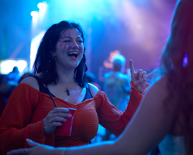 two women dancing in a a nightclub