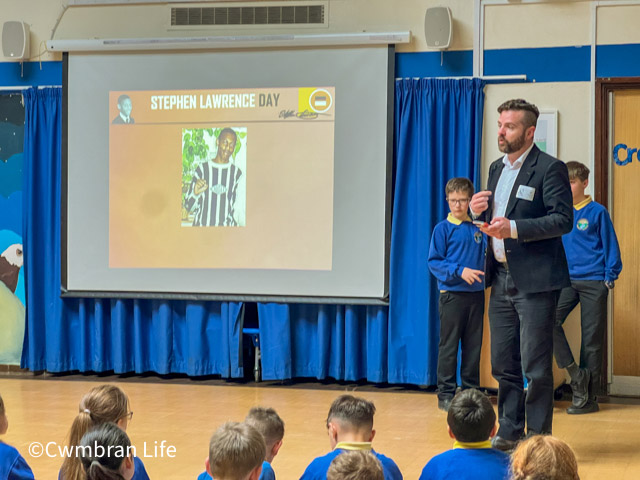 Cllr Anthony Hunt, leader of Torfaen Council, talks to pupils