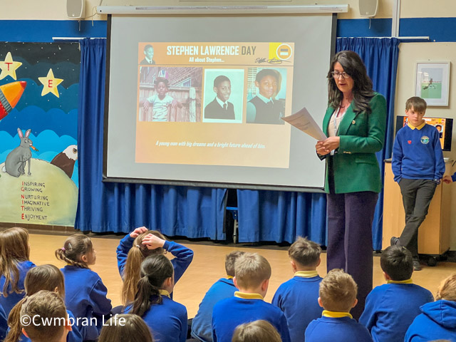 Sarah Roque, headteacher of Cwmffrwdoer Primary School, talks to pupils
