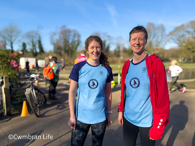 two women stood in running kit