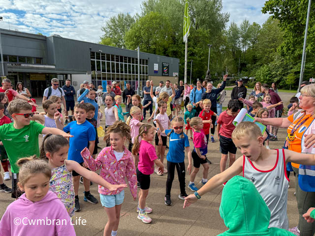 Children warm up at the start of Pontypool Junior Parkrun