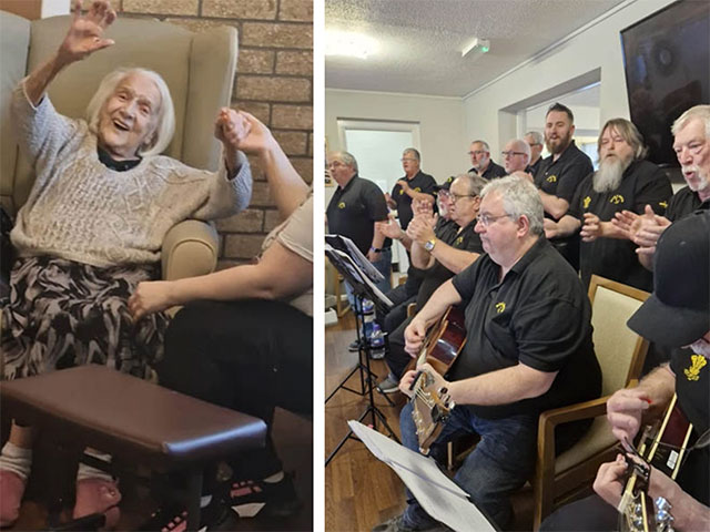 a sea shanty choir sing and a care home resident holds her hands in the air
