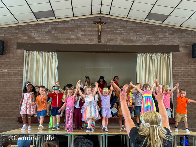 children dancing on a stage