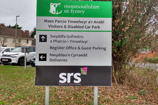 A sign for the Shared Resource Services known as SRS at Monmouthshire County Hall in Usk.