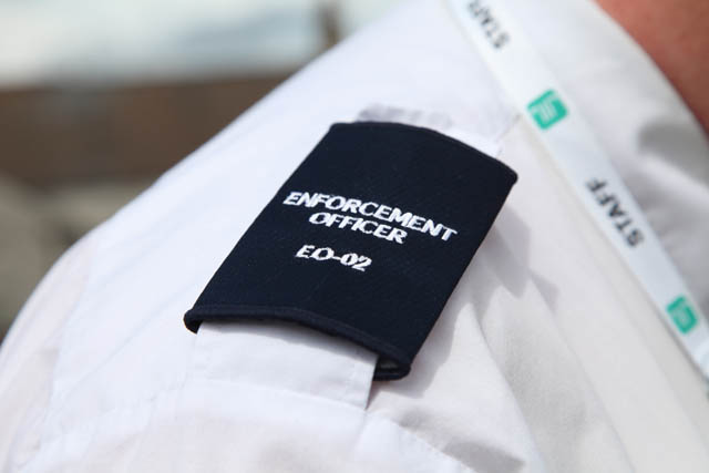 The shirt lapel of A Torfaen Borough Council Civil Enforcement Officer.