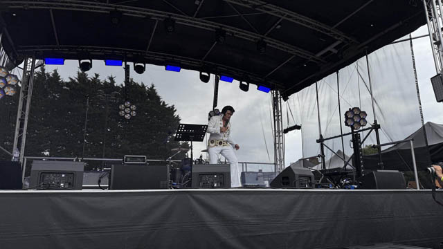 darren graceland jones on stage as Elvis tribute