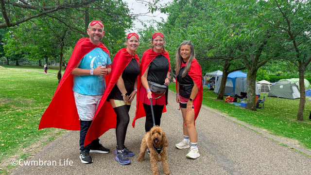 four people in superhero fancy dress