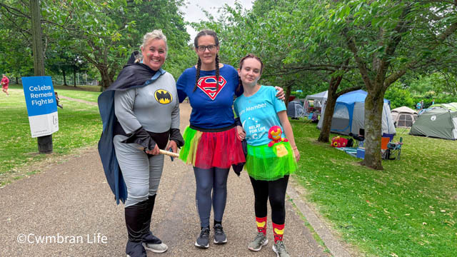 three people in superhero fancy dress