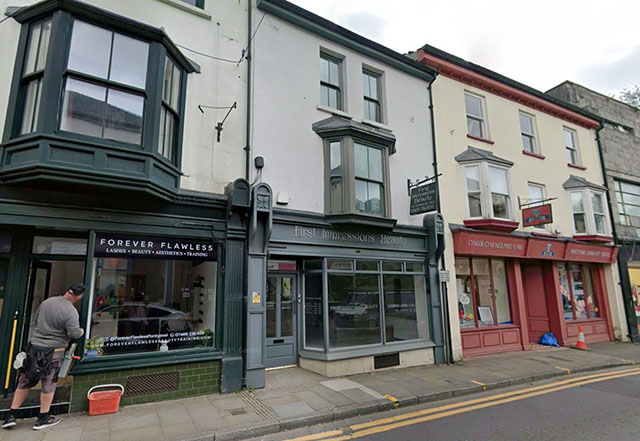 a high street photo of a several shops including a beauty salon