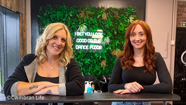 two women stood in a hairdressers