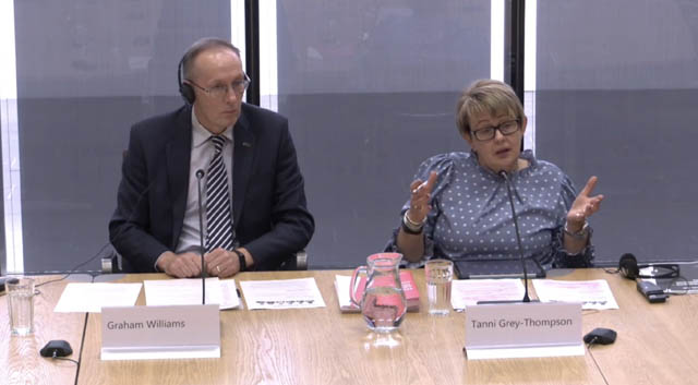 Tanni Grey-Thompson and Graham Williams at a desk