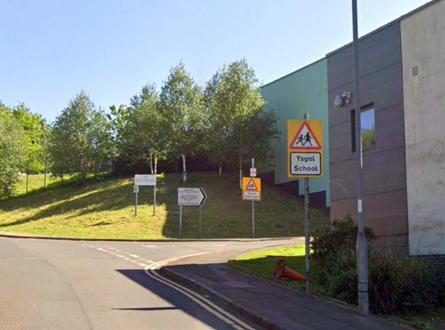 a road leading to a school