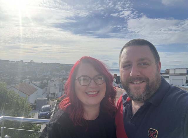 a man and woman take a selfie
