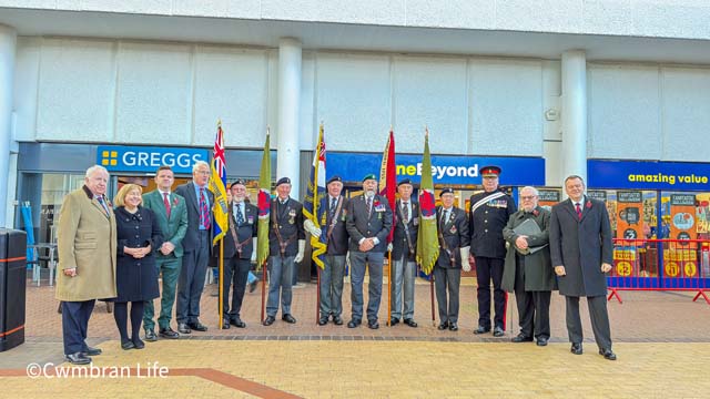 flag bearers, veterans, local politicans stood next to each other at launch of poppy appeal