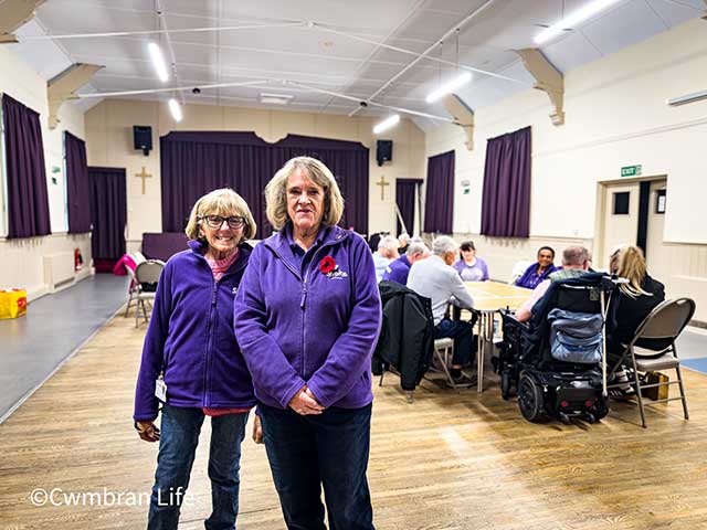 two women in purple tops with the 'stroke association' logo
