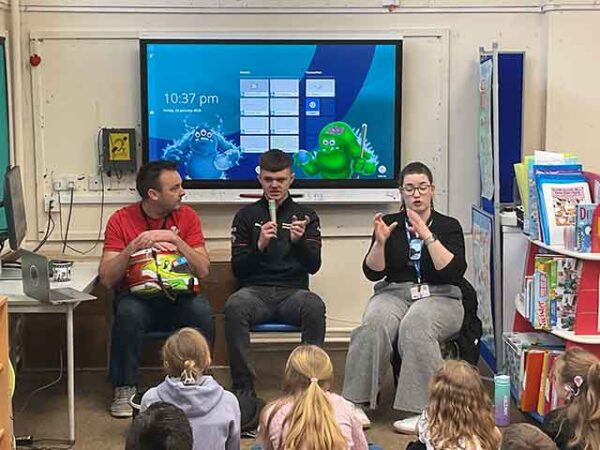 Deaf racing driver launches schools tour with pilot visit