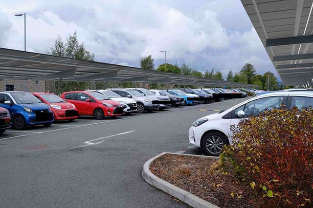 a car park with an artist's impression of solar panels over it