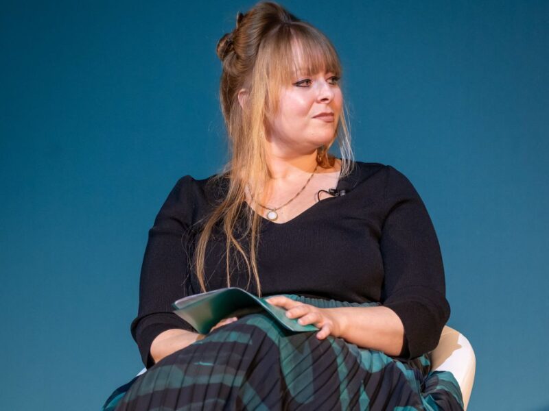 a woman sat on a a chair