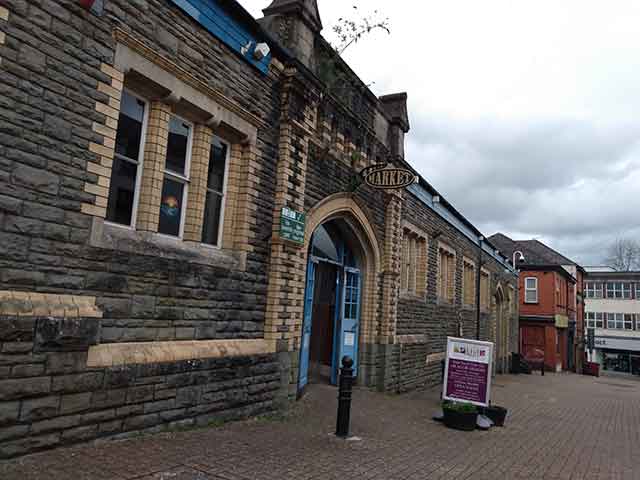 the entrance to an indoor market