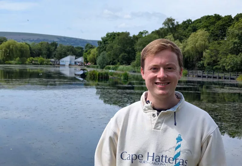 a man by a lake