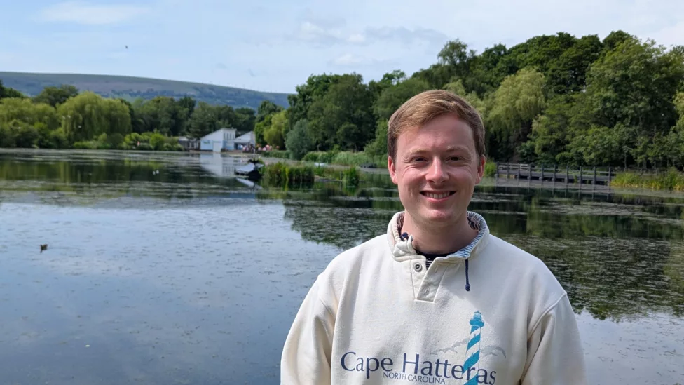 a man by a lake